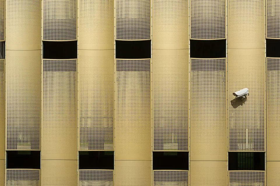 The Facade of a Building with a Security Camera