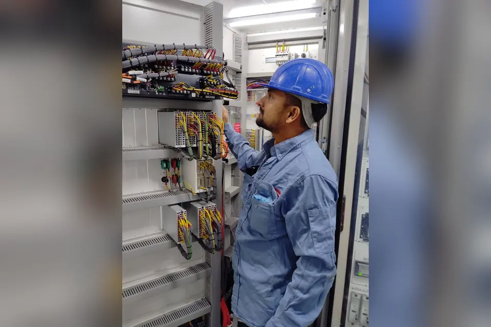 Electrician Working with Cables