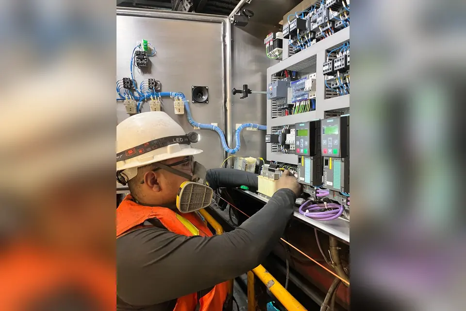 Man Fixing in Electric Box