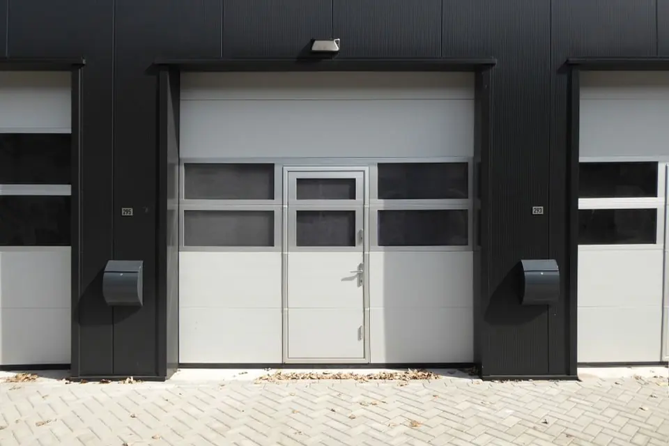 Modern Industrial Garage Door with Entrance