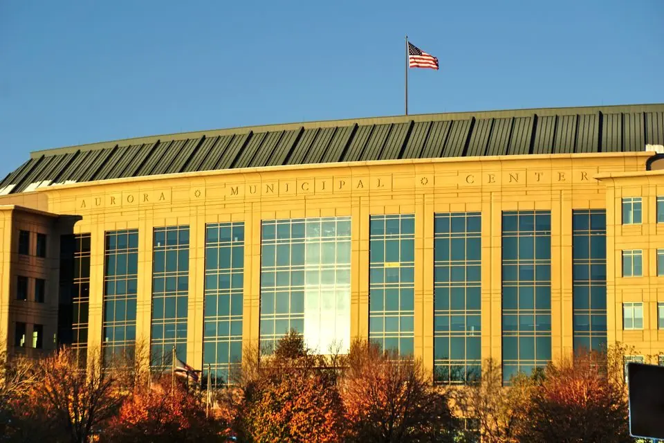 Aurora Municipal Center with American Flag