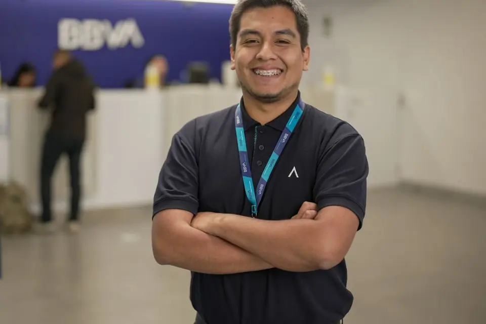 Smiling Bank Employee at BBVA Reception Desk