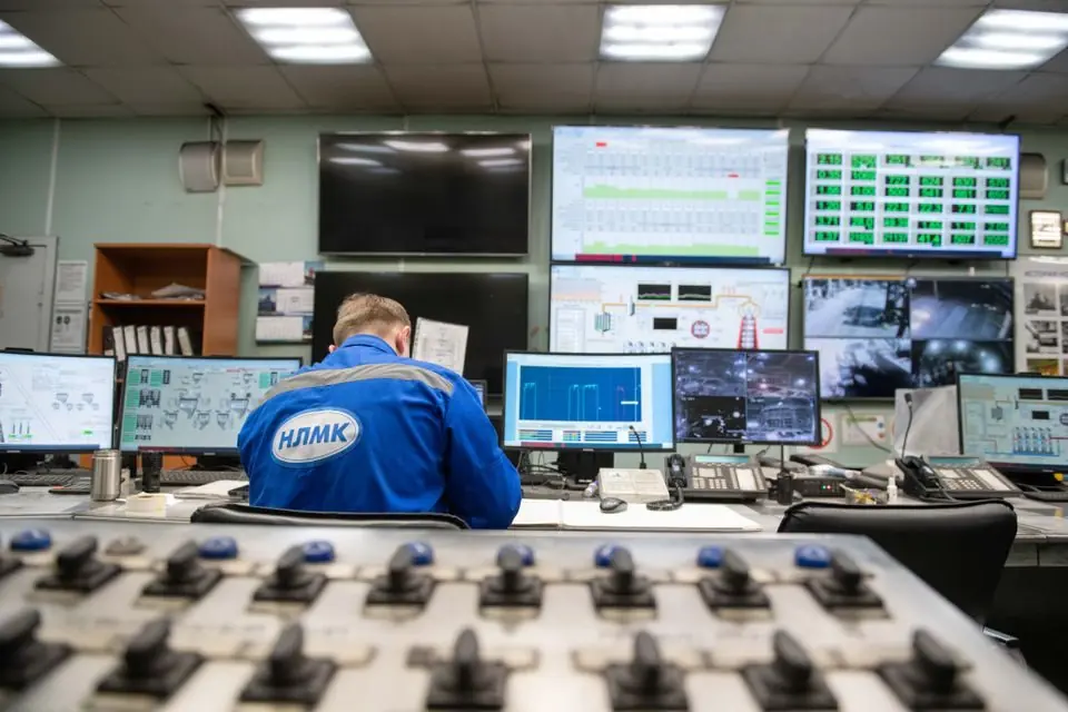 Engineer at Control Room Monitoring Screens