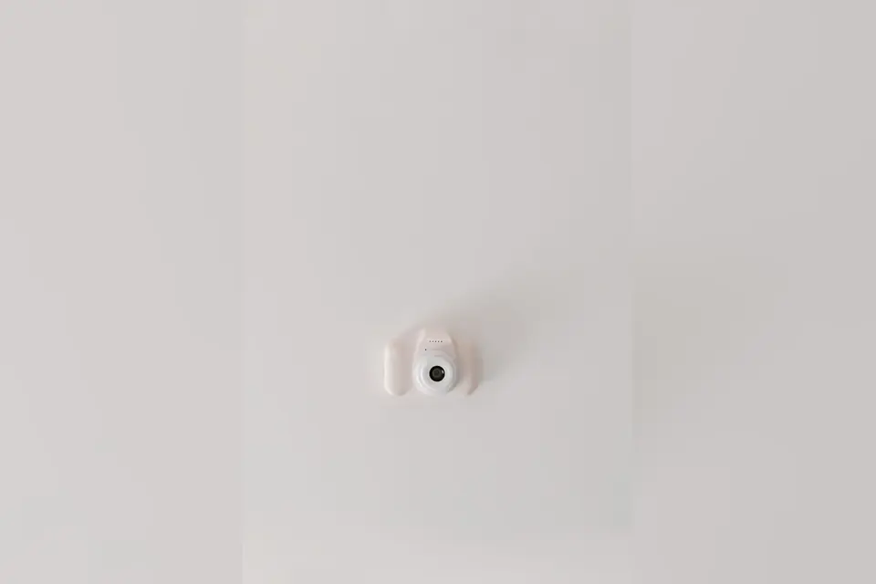 White Camera on a White Surface